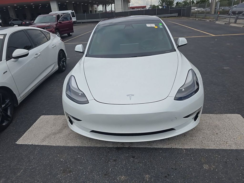 tesla model 3 2021 5YJ3E1EB0MF915551 image tesla model 3 2021 5YJ3E1EB0MF915551 image